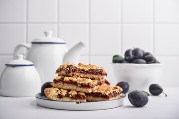 Traditional German Zwetschgenkuchen on white plate