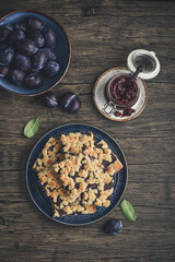 Traditional German Zwetschgenkuchen on blue plate