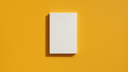 Empty white paper sheet isolated yellow background 