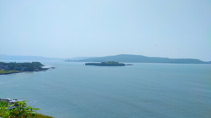view of the janjira fort in the sea from dongari hill in maharashtra in india.