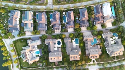 Aerial view of luxury houses with swimming pools by the lake Woodlands in Houston, Texas, United States	
