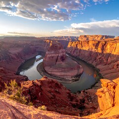 Aerial shot of a canyon river bend at sunset