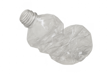 Crushed plastic bottle representing waste, environmental pollution, and the need for recycling efforts