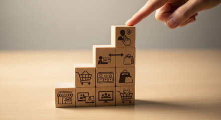 Fototapeta premium E commerce growth strategy online shopping business success plan wooden blocks finger pointing concept
