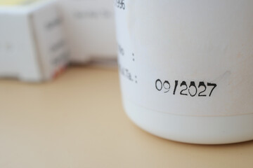 Expiration date printed on a medicine container 