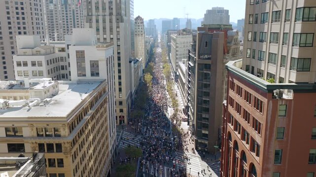 Large Group of Thousands of Protestors Marching Through Streets of San Francisco 2025