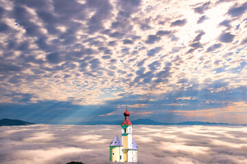 北海道の雲海とヨーロッパ風教会合成写真
