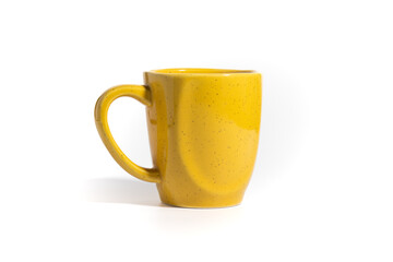Vibrant yellow ceramic coffee mug with a speckled texture, isolated on a pure white background. Bright and cheerful drinkware for breakfast, cozy, or cafe themes.
