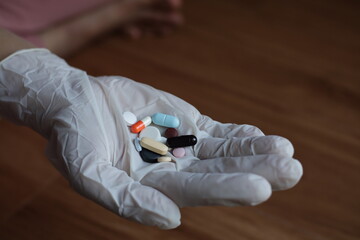 Hand Holding Pills