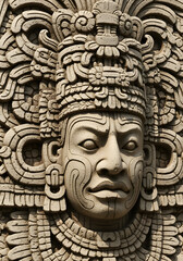 Obraz premium Detailed Mayan Stone Carving of a Head in Beige and Brown Tones