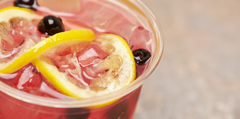 red cocktail with ice