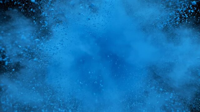 Blue Powder Explosion: A vibrant explosion of blue powder fills the frame, creating a mesmerizing display of color and texture, capturing the raw energy and dynamic force.