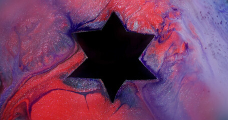 Paint spatter star. Geometric background. Defocused red purple blue colorful glitter bubble sparkling dark black water on bokeh abstraction.