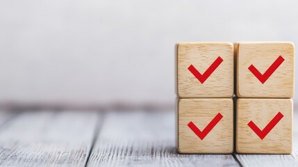 A set of wooden blocks displaying red check marks, symbolizing completion or approval, placed on a textured surface.