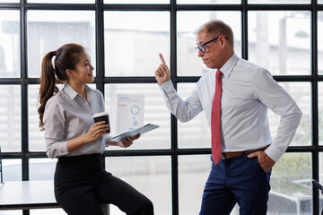 Business team discussing together business plans in the office
