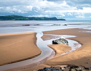 Sandy beach channels, calm water, cloudy sky