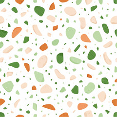 Terrazzo pattern with green and orange elements.
