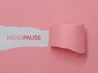 Word Menopause. Minimal concept hormone replacement therapy. Сopy space