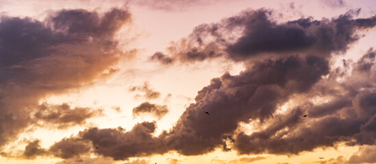 Skyscape with sea horizon. Horizon sunrise sea with ship. Sunrise seascape. Romantic summer vacation seascape. Golden hour. Sea sunset horizon. Sunset cloudy sky. Seascape at summer vacation