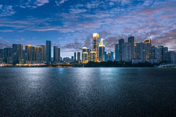 Fototapeta premium Empty asphalt ground with city skyline and financial district in Chongqing.