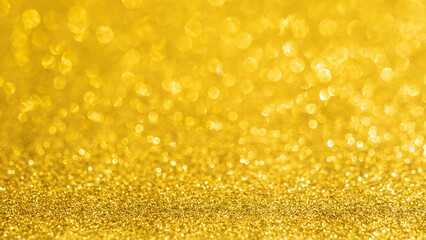 Abstract gold glitter sparkle texture with bokeh background