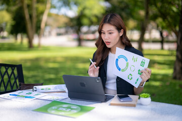 Businesswoman presenting environmental data during outdoor video call