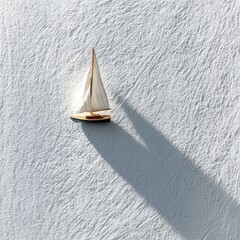 Minimalist Miniature Sailboat with Long Shadow on Textured White Surface, Evoking Calm Journey.