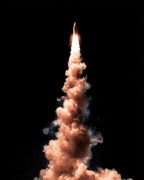 Rocket soars through the night sky in a powerful launch dramatic angle with smoke and fire