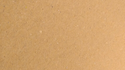 Background of brown kraft paper or cardboard texture. Beige background with a textured, paper-like style. The beige color adds.