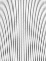 White background with vertical straight lines, imaginative concept. White background image with many straight lines.