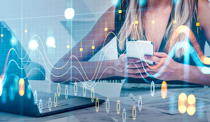 Woman using a smartphone at desk with digital financial graphs overlay, modern abstract style, indoor office background, concept of stock market analysis