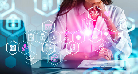Woman in lab coat using futuristic digital medical interface, colorful holographic icons overlay, office background, concept of modern healthcare innovation