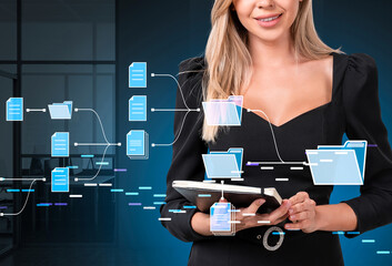 Businesswoman holding notebook with digital file icons overlay, futuristic style on office background, concept of data management and information systems