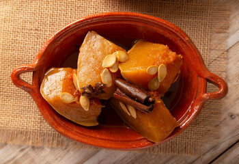 Calabaza en Tacha. Spiced Candied Pumpkin. Mexican dessert whose main ingredients are pumpkin and piloncillo, also known as Chacualole or Dulce de Calabaza, widely used in Day of the Dead offerings.