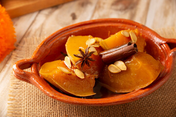 Calabaza en Tacha. Spiced Candied Pumpkin. Mexican dessert whose main ingredients are pumpkin and piloncillo, also known as Chacualole or Dulce de Calabaza, widely used in Day of the Dead offerings.