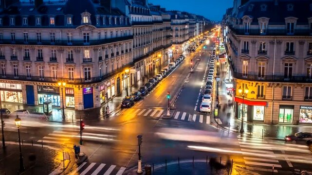 Nighttime cityscape with illuminated streets and bustling shops in Paris