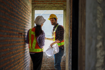 Architects and engineers discuss teamwork, construction, and happiness for real estate, complete...