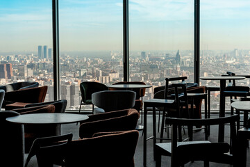 Cozy Business Meeting Room Interior with Table and Chairs, Panoramic Window
