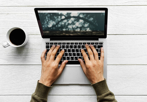 Hands Typing On Laptop Outdoors Mockup PSD