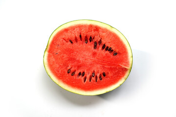 Red Watermelon Fruit half Slice on Clean White Surface.