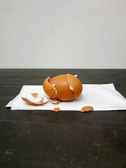broken egg on a wooden table