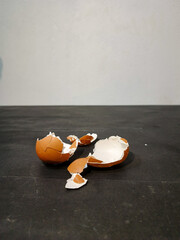 broken egg on a wooden table