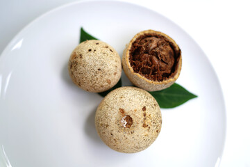 Tropical Woodapples on Clean White Surface.