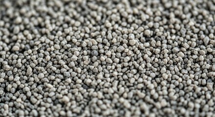 Tiny pebble gravel &mdash; uniform gray granular background