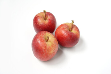Three Fresh Red Apples Isolated on White Background.