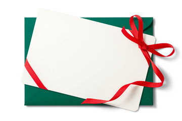 リボンを結んだカードと緑色の封筒