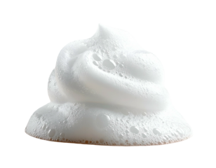 Fluffy, white foam, stacked in a swirling peak, isolated on black