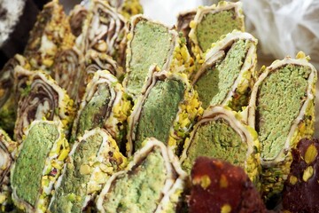 Several types of fruit and pistachio Turkish delight on the market. Gluten-free oriental sweets. Lactose-free.