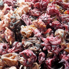 Close up of burgundy dried hibiscus flowers for tea 