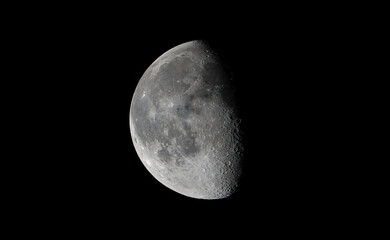 The Waxing Gibbous Moon Over Dark Sky